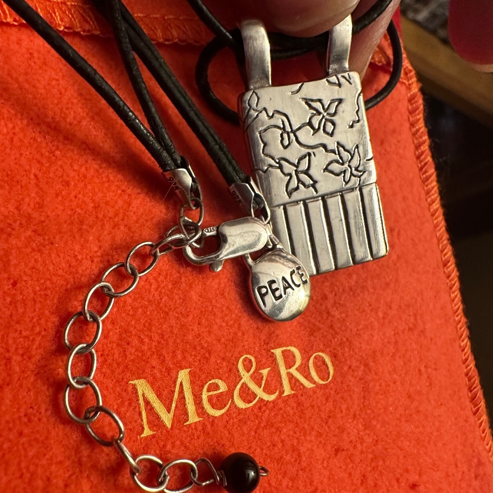 WOW POSHMARK - 
Authentic Me&Ro Sterling Floral Peace Pendant Leather Cord